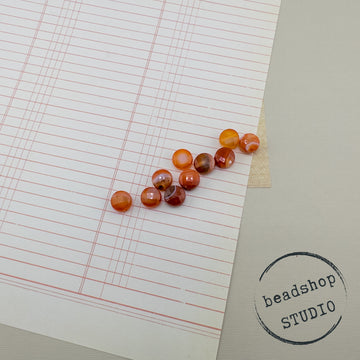 Carnelian Faceted Coins- 10mm