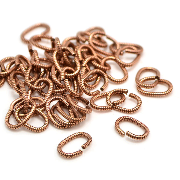 9mm/16g Oval Coil Jump Rings- Antique Copper - Beadshop.com