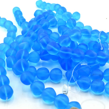 beadshopSTUDIO Vintage Glass Transparent Aqua Matte Dented Ball