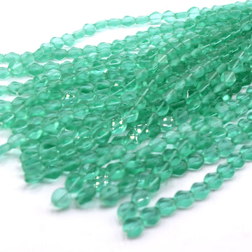 beadshopSTUDIO Vintage Glass Transparent Lt. Teal Diamond Cut