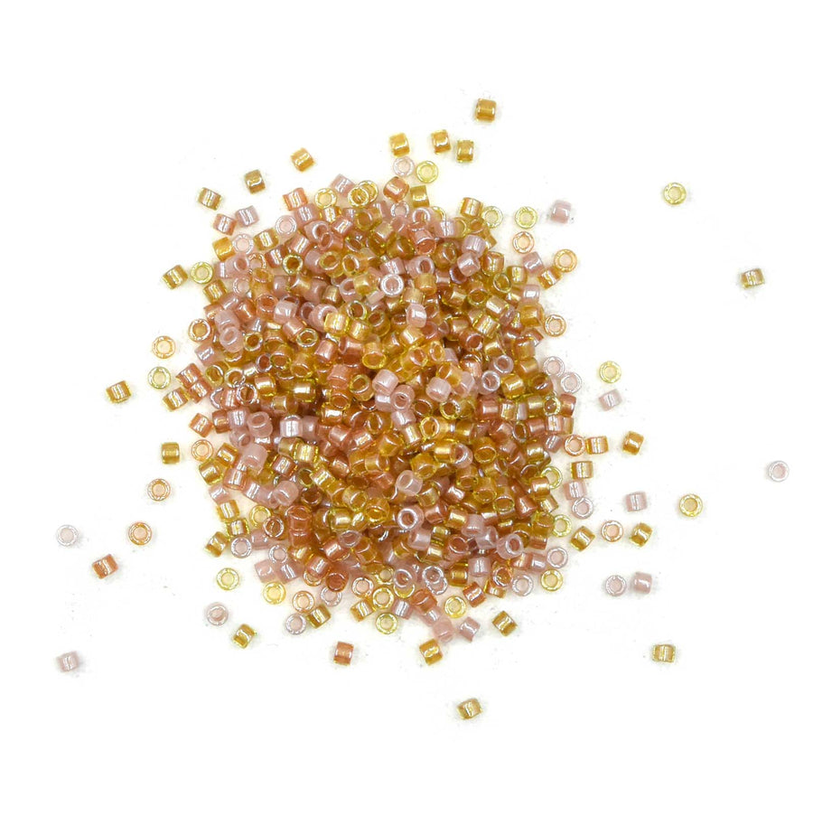 DB0987- 11/0 Sparkling Lined Golden Peach Mix