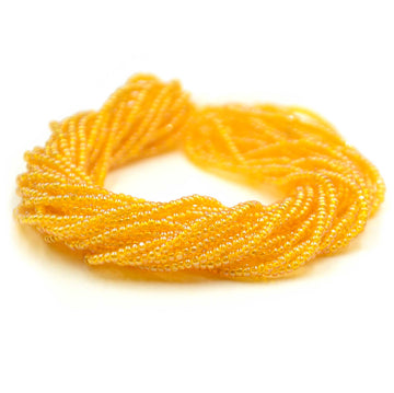 13/0 Charlottes- Transparent Sunny Yellow Luster