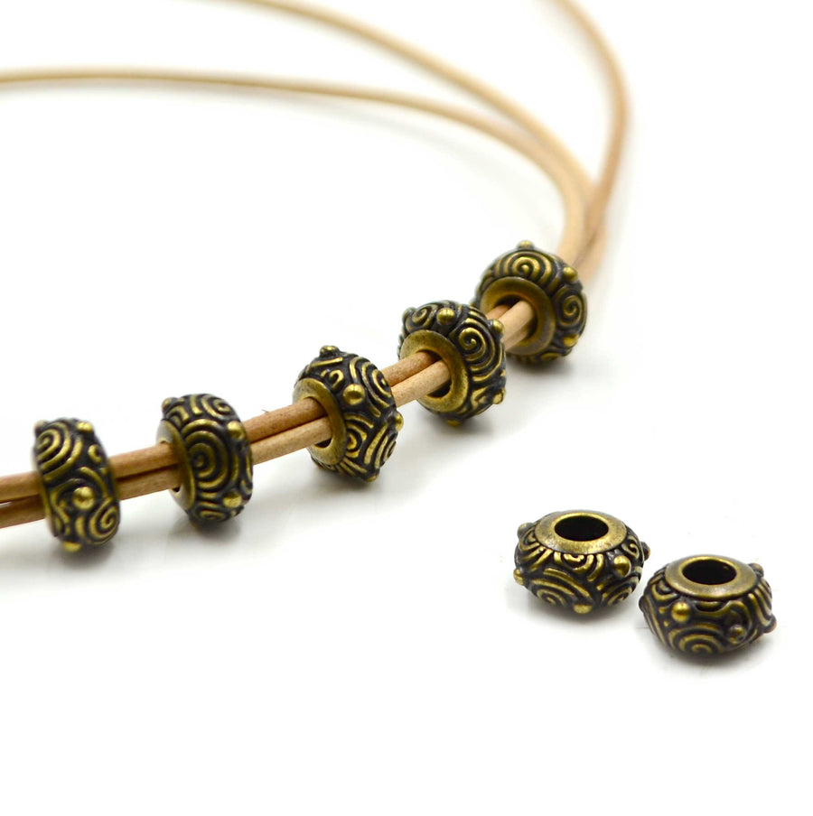Petroglyphs- Antique Brass